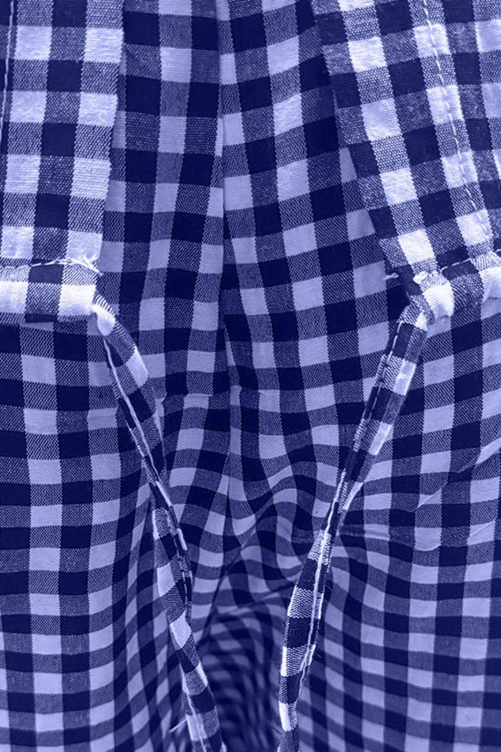 Conjunto de pantalón y blusa de media manga con cuello redondo y cuadros escoceses de talla grande