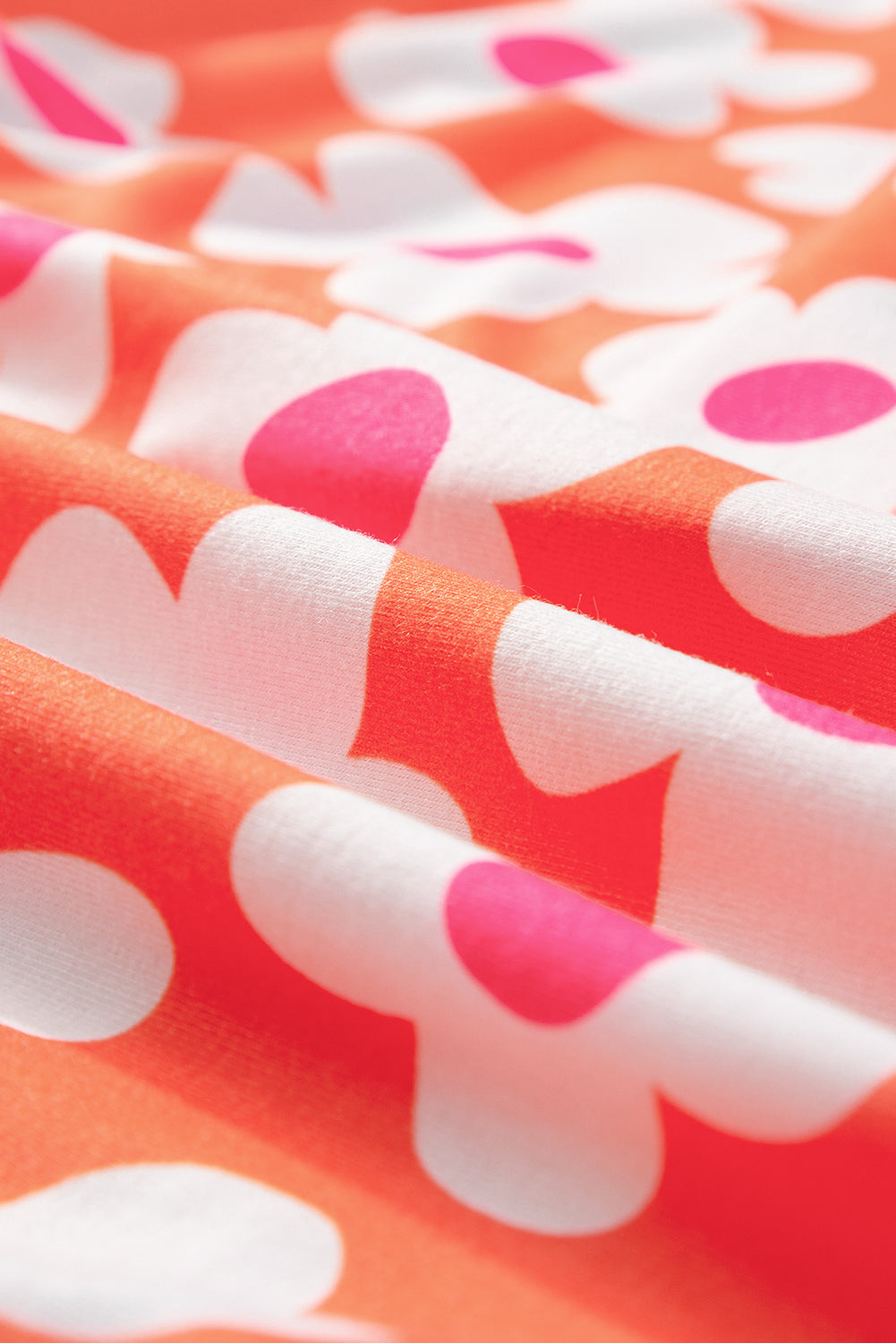 Conjunto de salón con top de media manga y pantalones cortos con flores y bolsillos