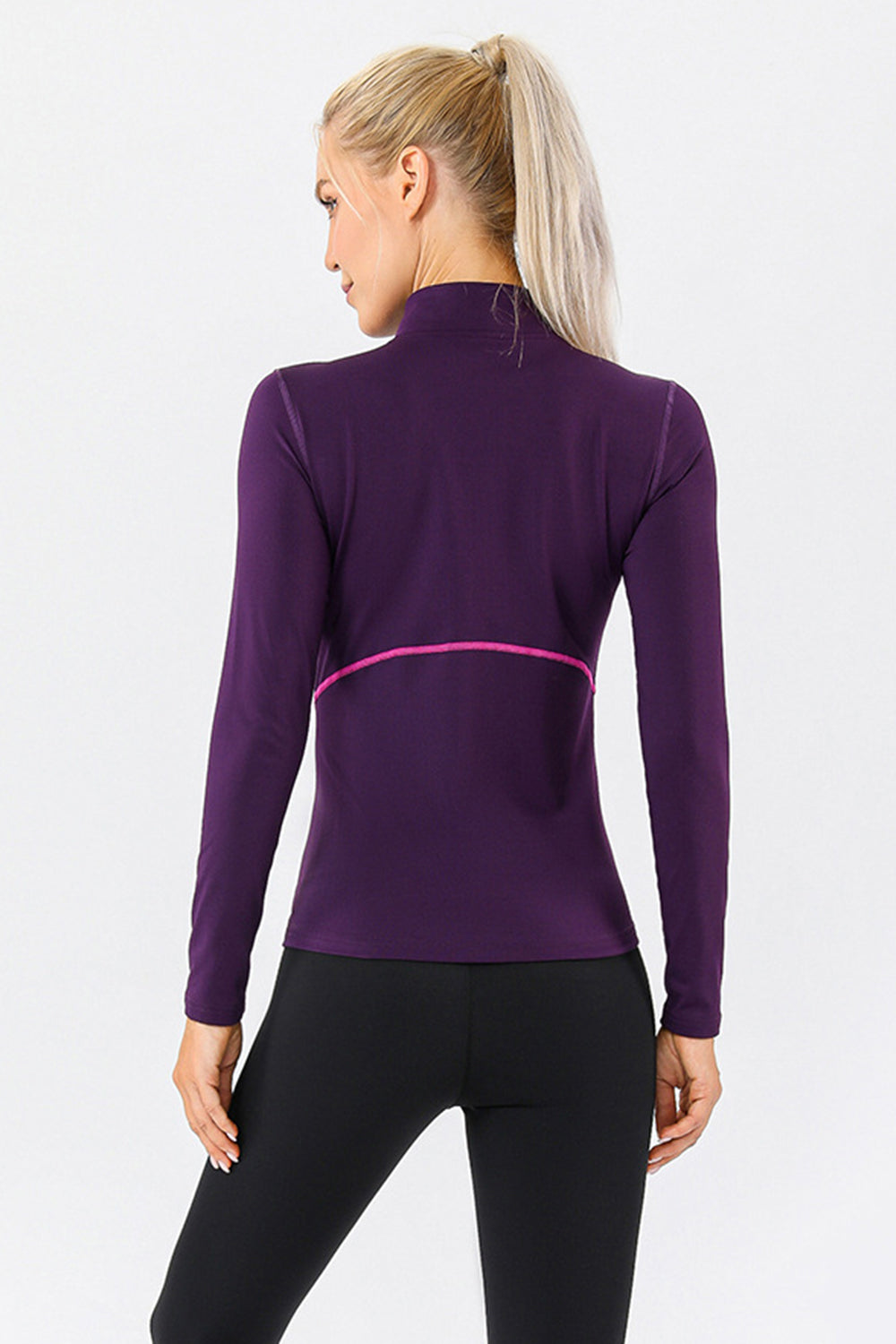 Camiseta deportiva con cuello alto y cremallera de un cuarto