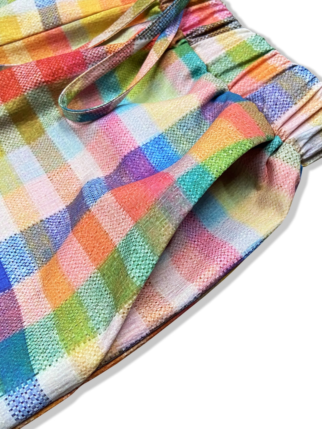 Pantalones a cuadros con bolsillos y lazos en contraste