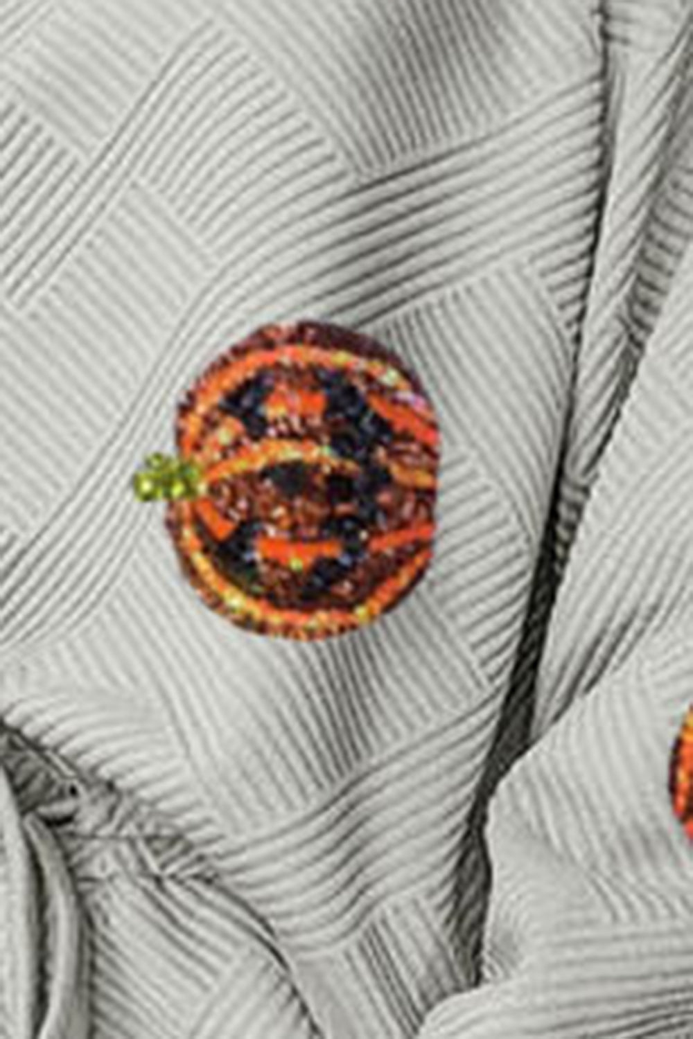 Conjunto de top y pantalón con parche de calabaza y lentejuelas