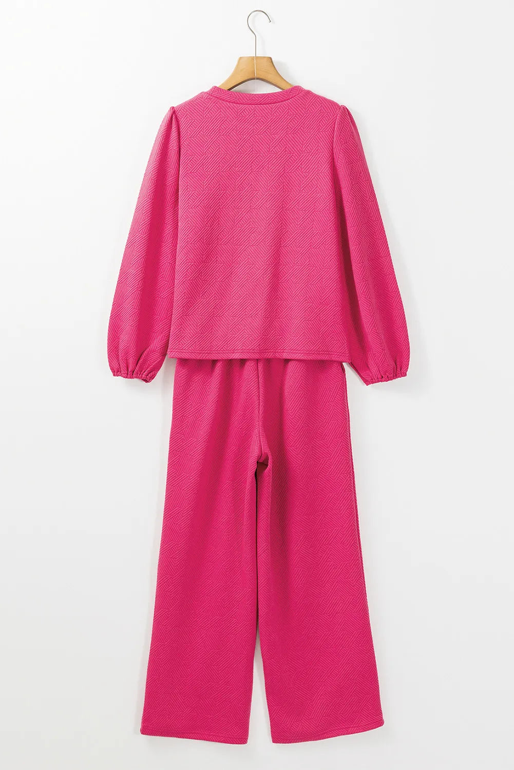 Conjunto de pantalón y top de manga larga con cuello redondo