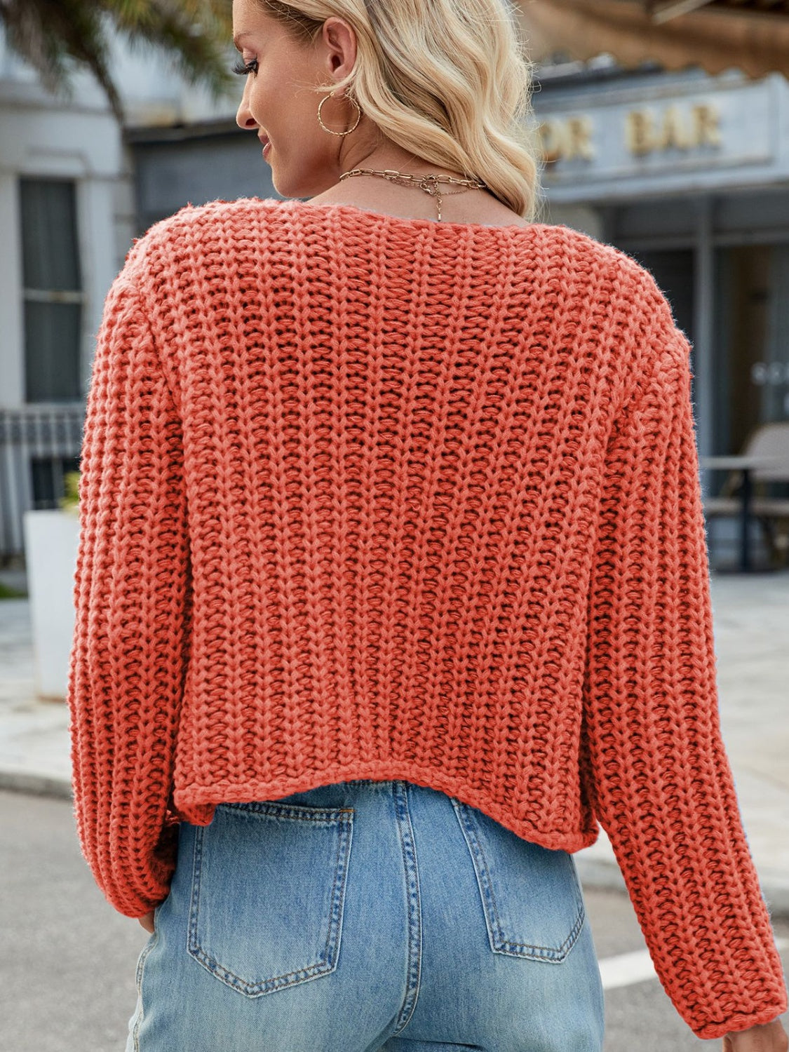 Cárdigan de cuello redondo con botones y bolsillos