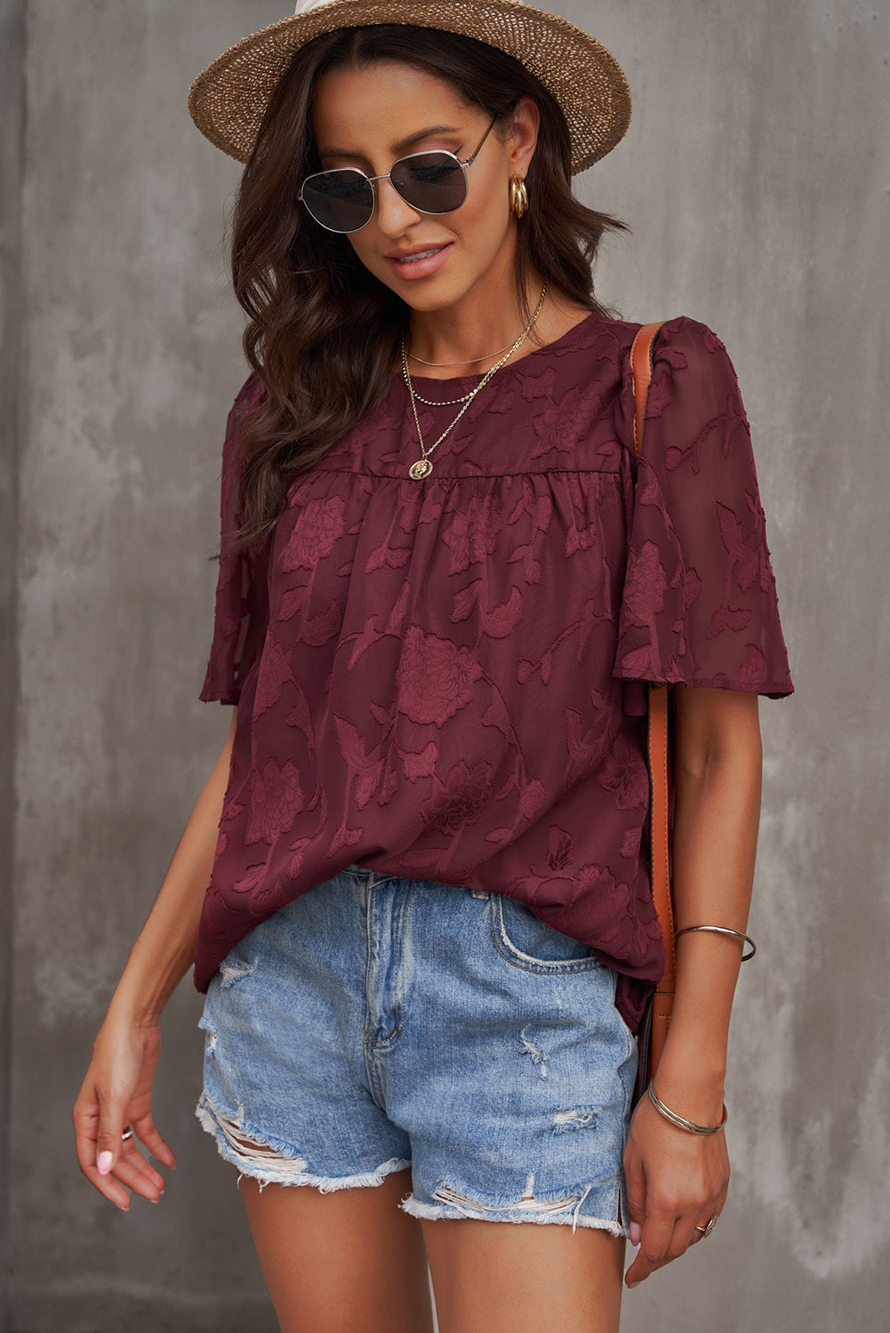 Blusa con cuello redondo y mangas abullonadas