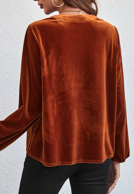 Blusa de terciopelo de manga larga con muescas