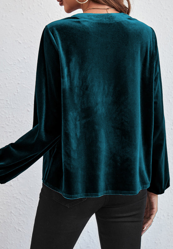 Blusa de terciopelo de manga larga con muescas