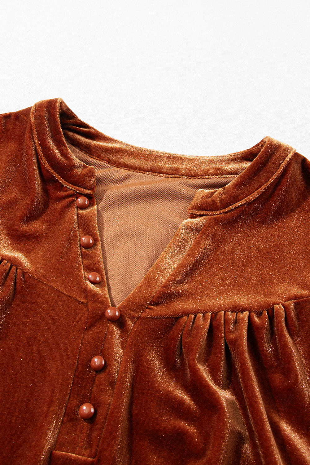 Blusa de terciopelo de manga larga con muescas