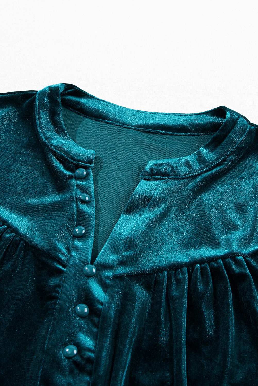 Blusa de terciopelo de manga larga con muescas