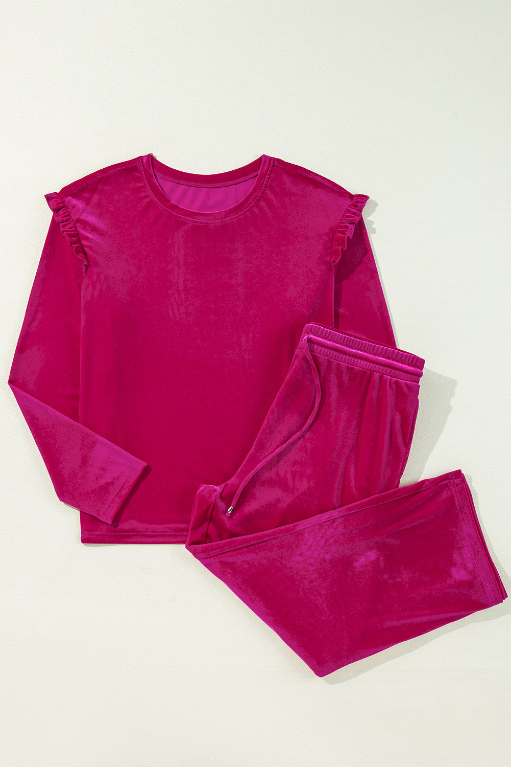 Conjunto de pantalón y top de manga larga con cuello redondo y volantes