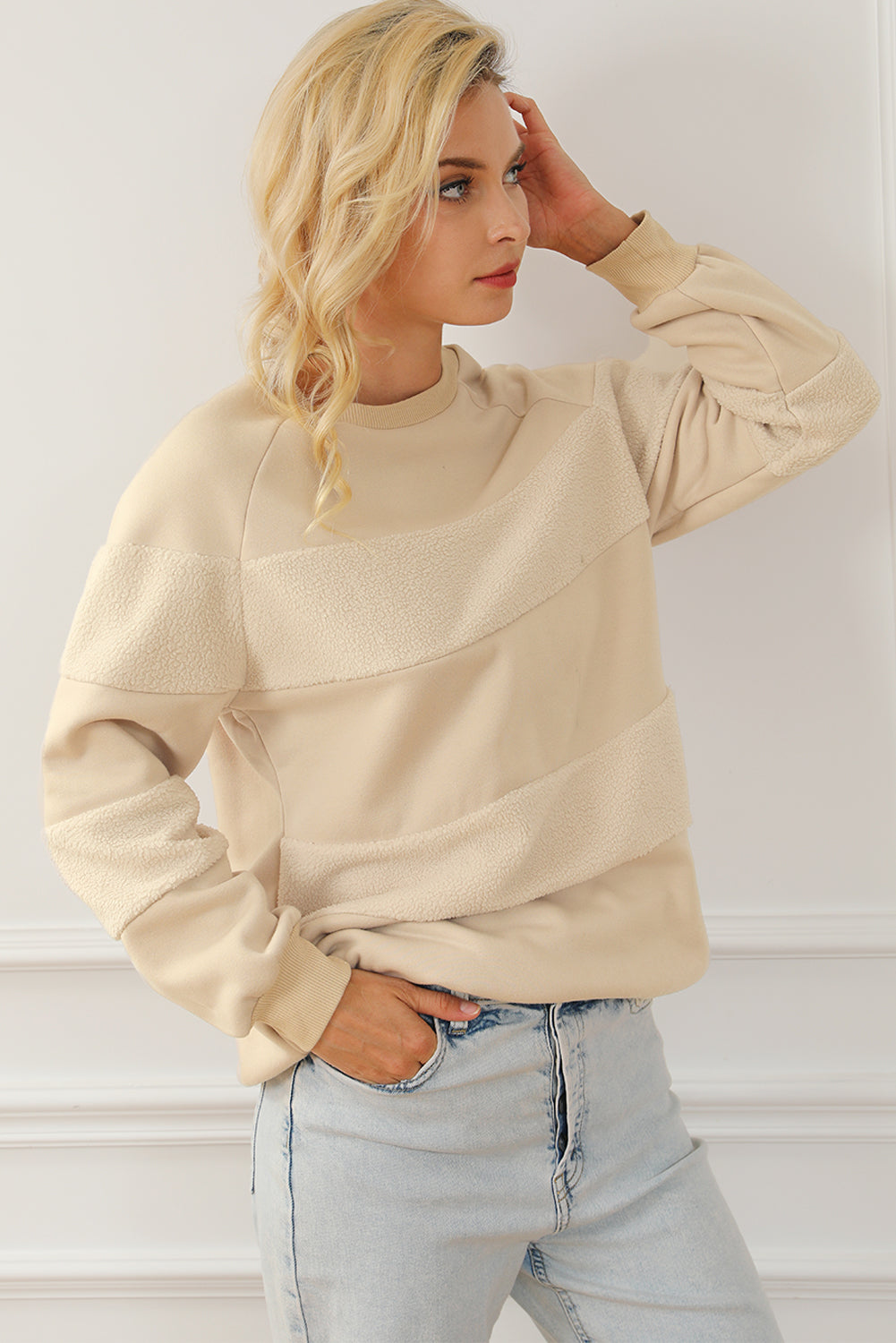 Sudadera con cuello redondo y mangas raglán