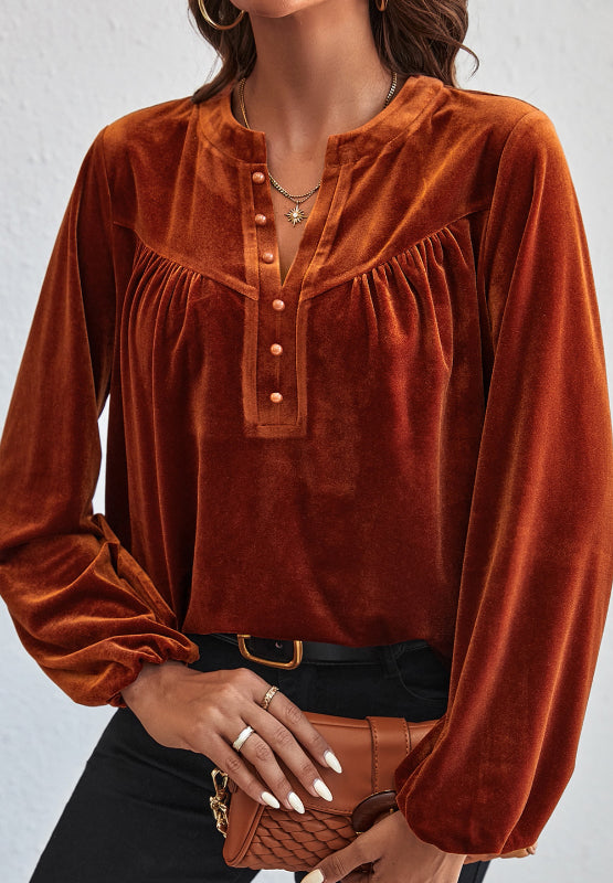 Blusa de terciopelo de manga larga con muescas