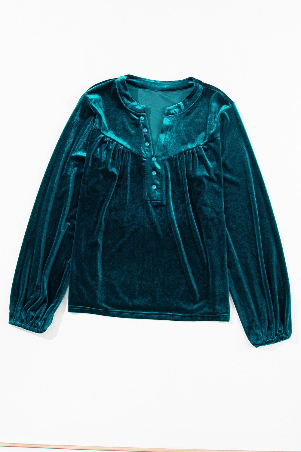 Blusa de terciopelo de manga larga con muescas