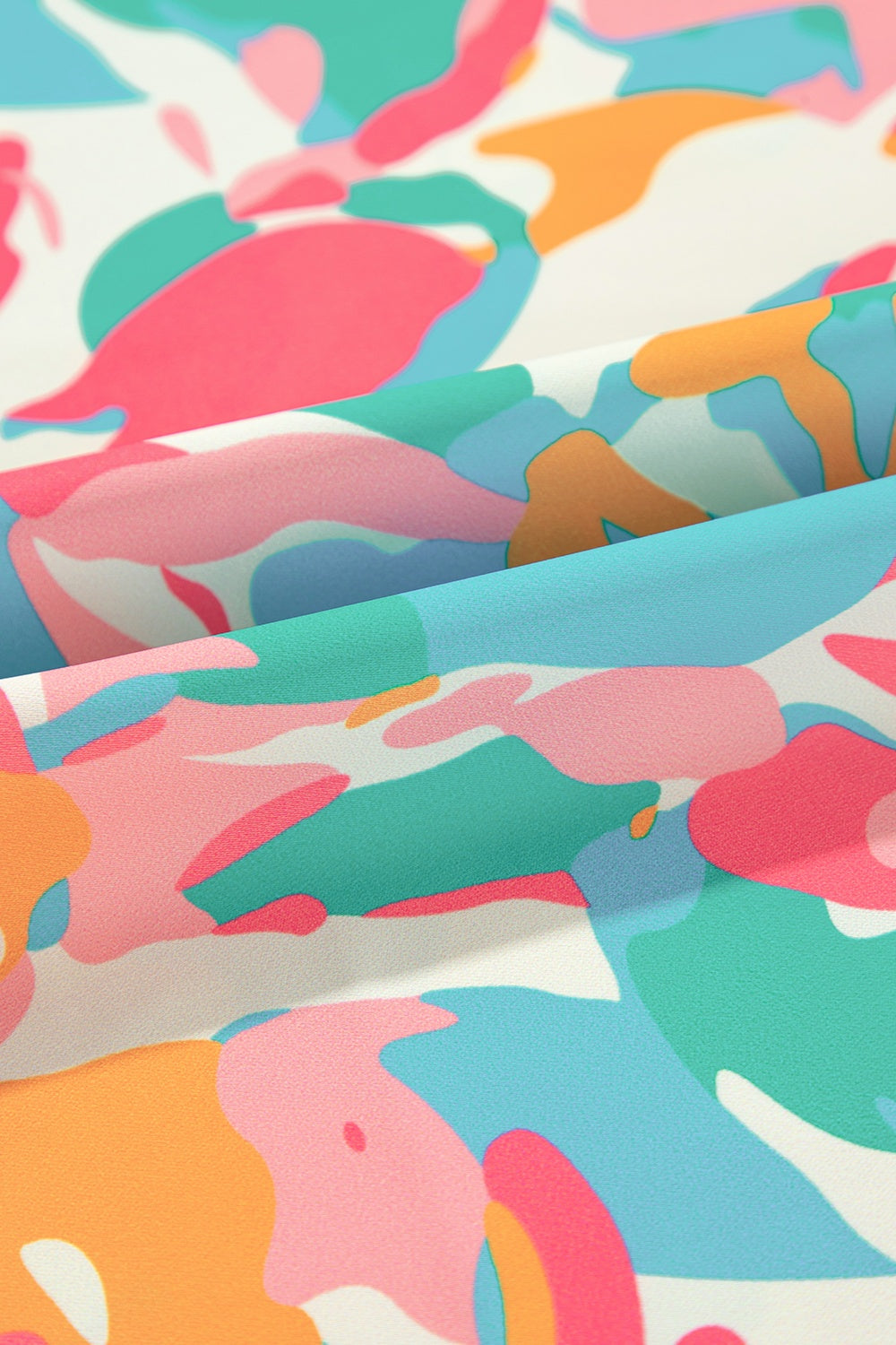 Conjunto de pantalón y blusa con mangas cortas y estampado de muescas