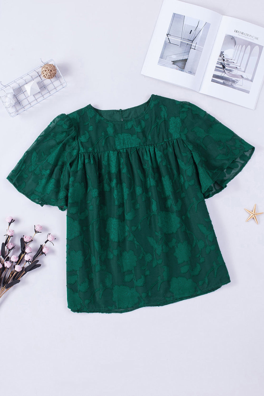 Blusa con cuello redondo y mangas abullonadas