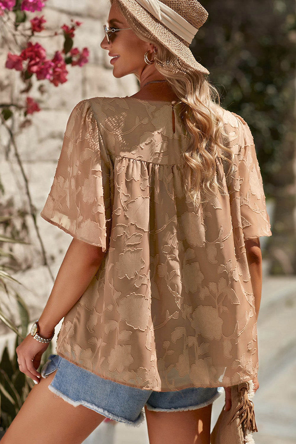 Blusa con cuello redondo y mangas abullonadas