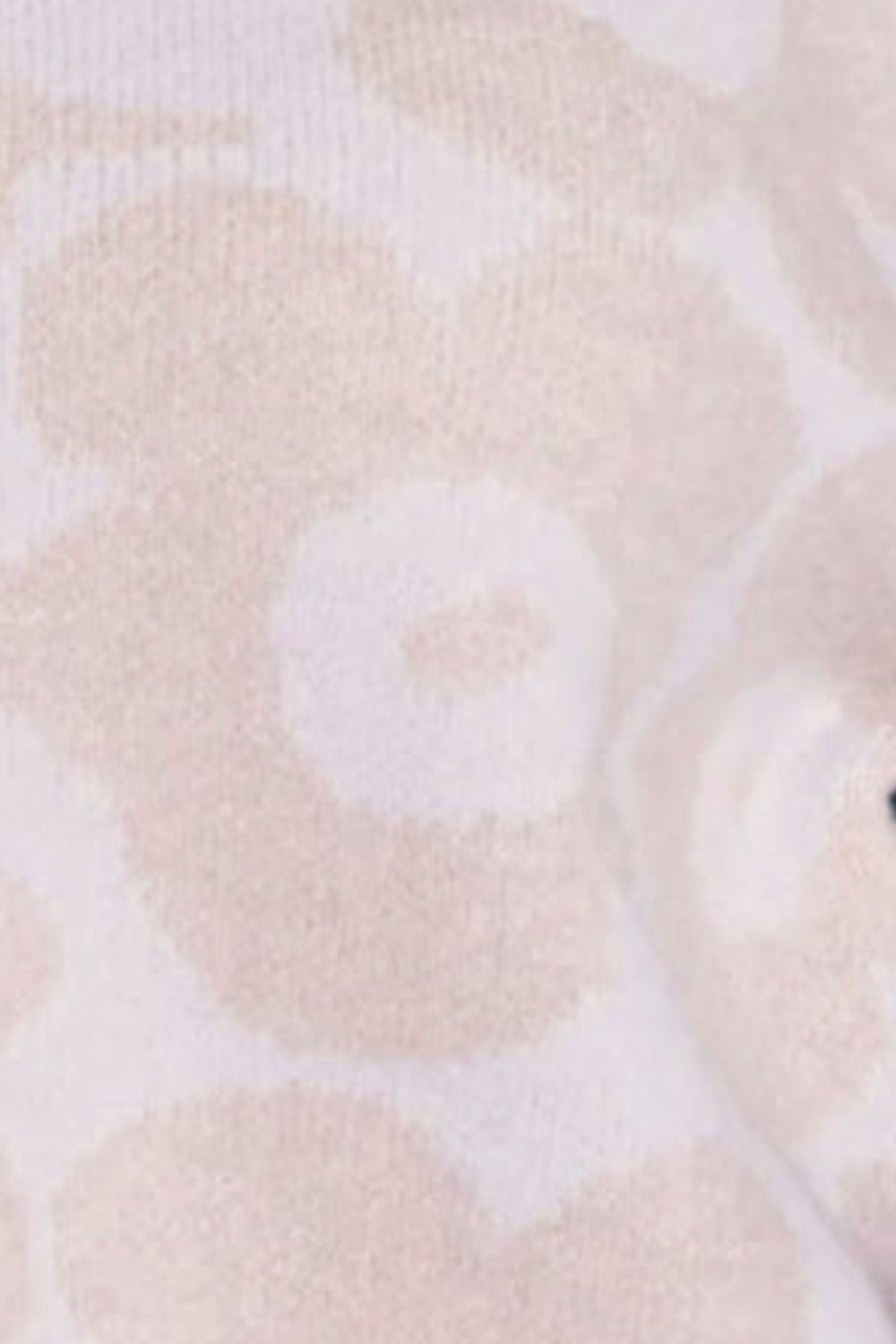 Suéter de cuello alto y manga larga con estampado de flores