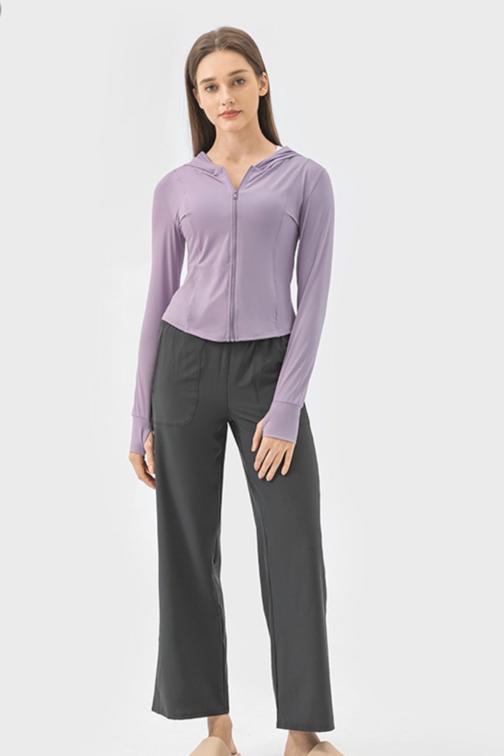 Prendas de abrigo deportivas de manga larga con capucha, cremallera y bolsillos Millennia