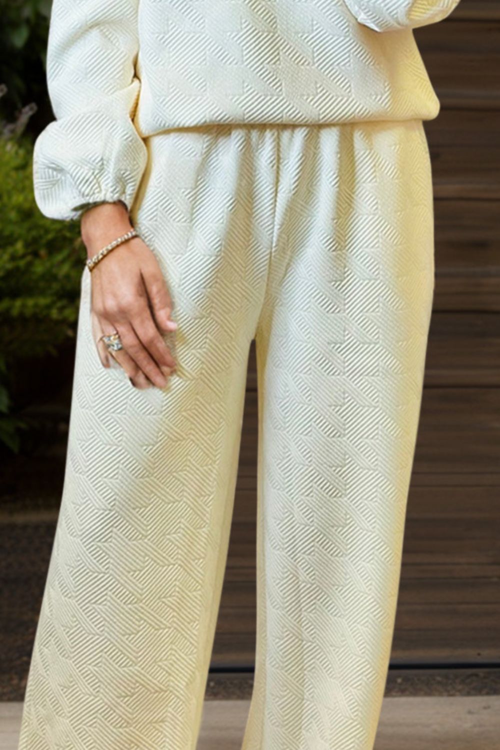 Conjunto de pantalón y top de manga larga con cuello redondo
