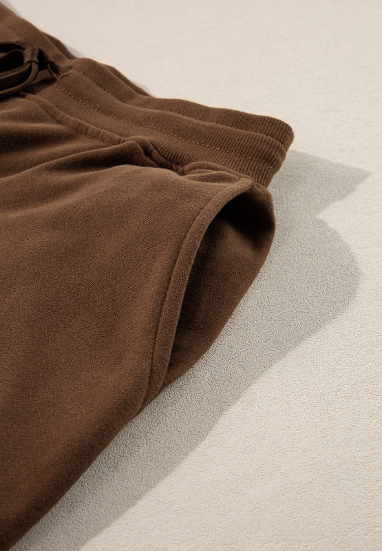 Conjunto de pantalón y top de manga larga con cuello redondo y abertura lateral