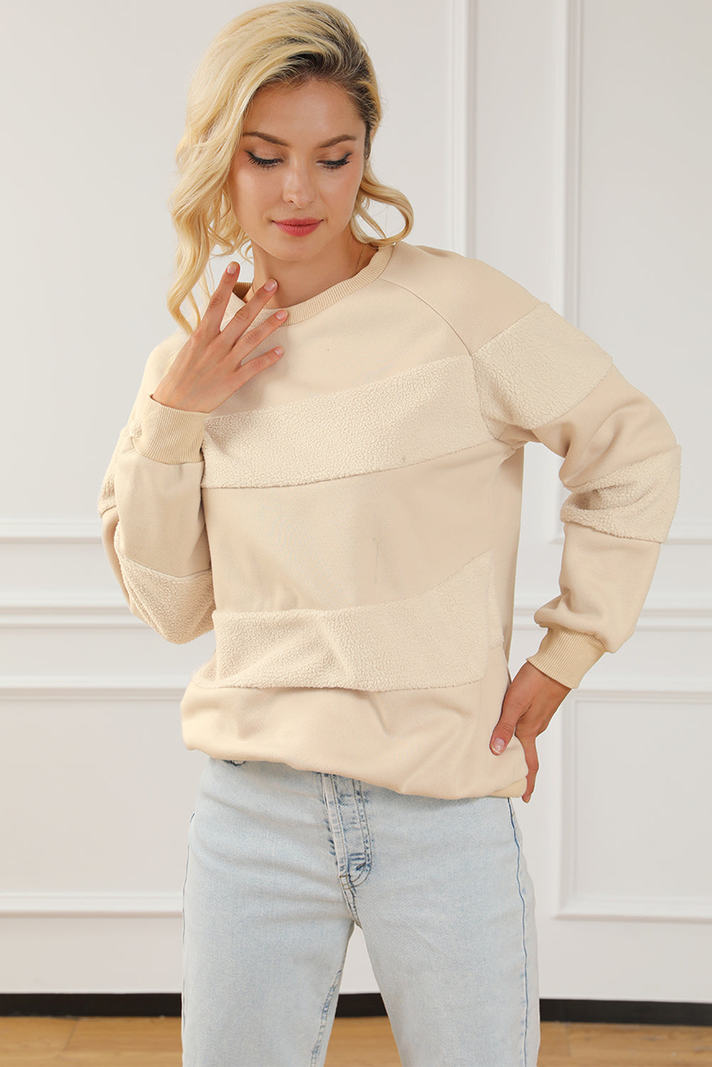 Sudadera con cuello redondo y mangas raglán