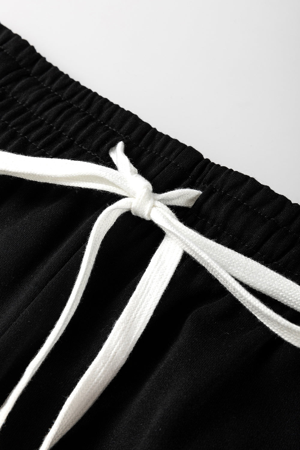 Conjunto de pantalón y top de manga larga con cuello redondo a rayas