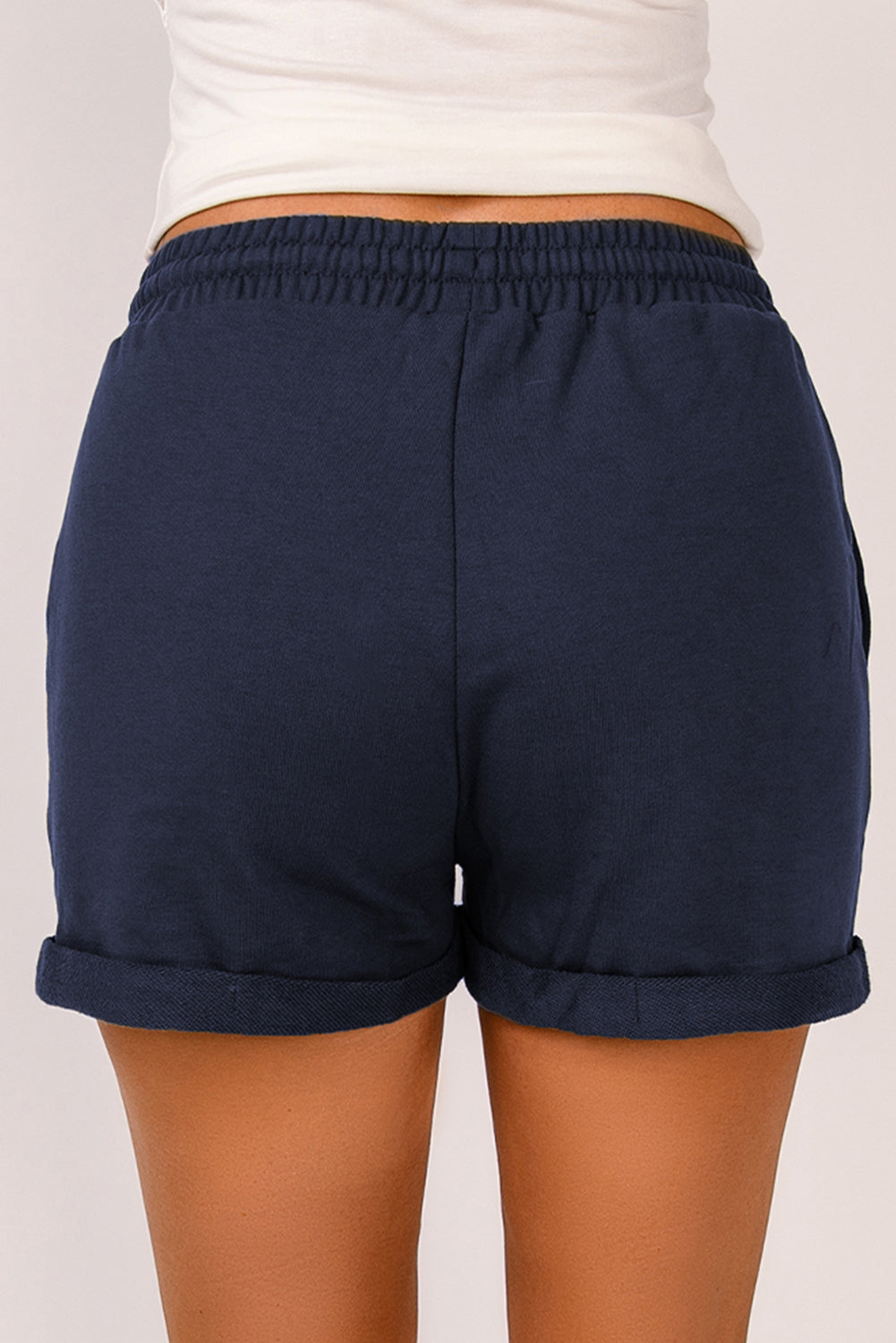 Pantalones cortos con puños y cordón en la cintura