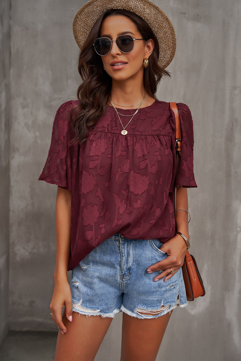 Blusa con cuello redondo y mangas abullonadas