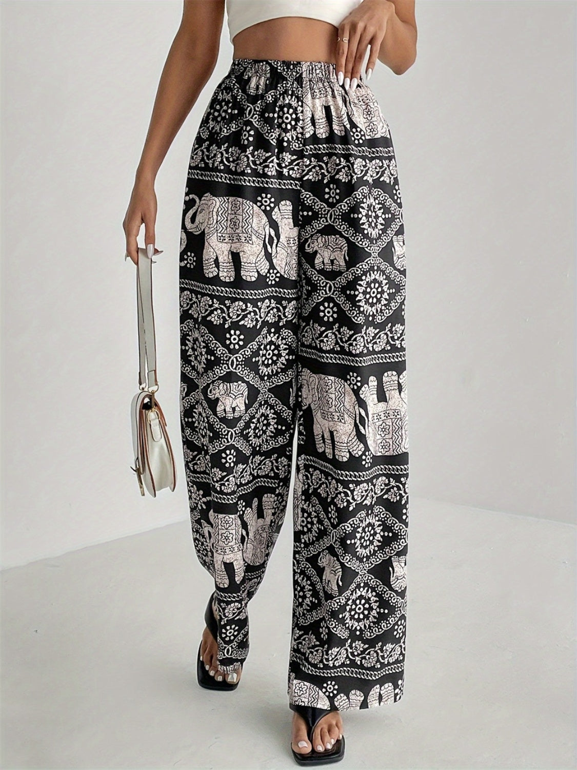 Pantalones anchos con cintura elástica y estampados