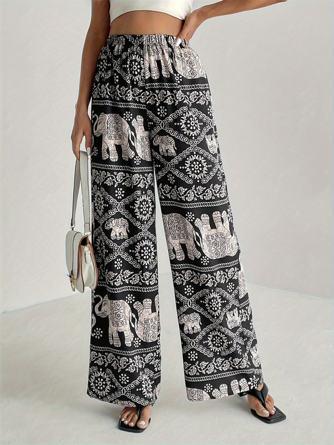 Pantalones anchos con cintura elástica y estampados
