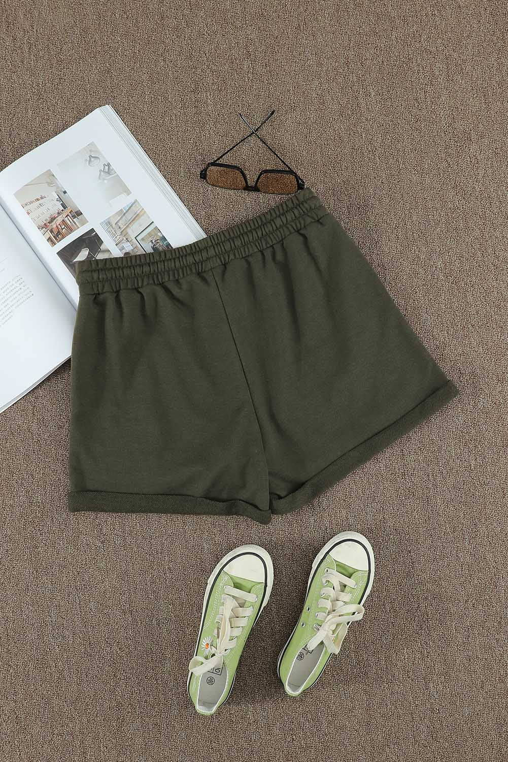 Pantalones cortos con puños y cordón en la cintura