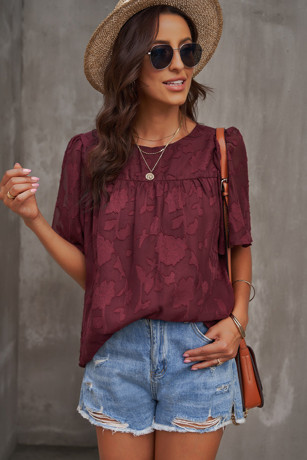 Blusa con cuello redondo y mangas abullonadas