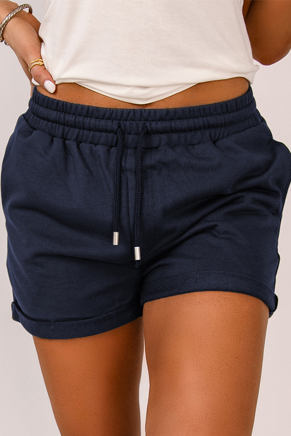 Pantalones cortos con puños y cordón en la cintura
