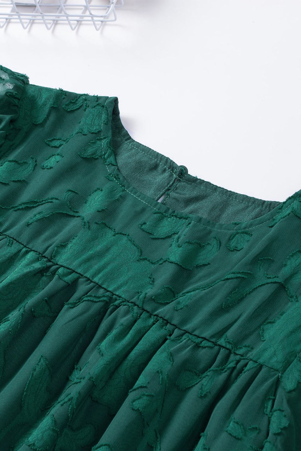 Blusa con cuello redondo y mangas abullonadas