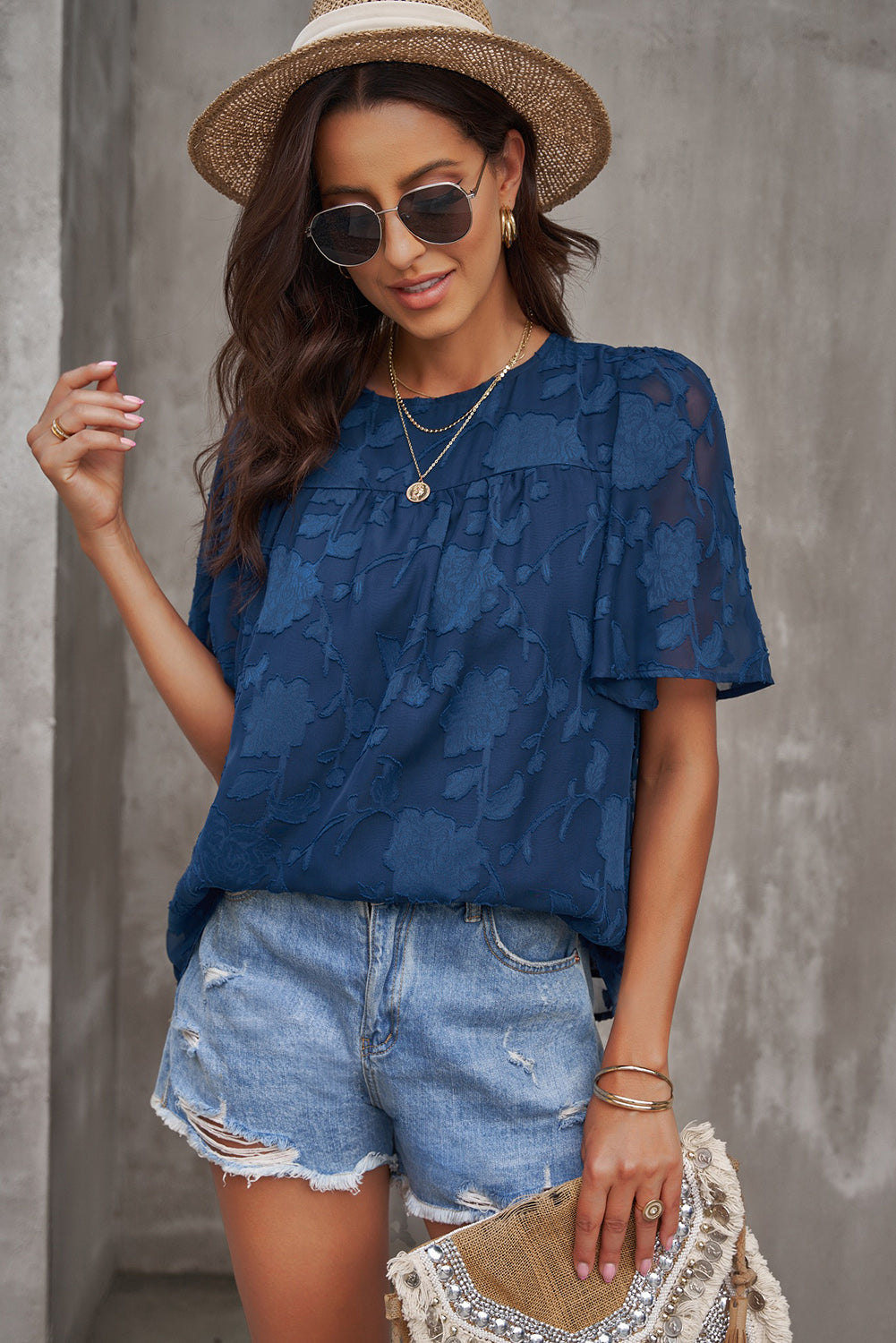 Blusa con cuello redondo y mangas abullonadas