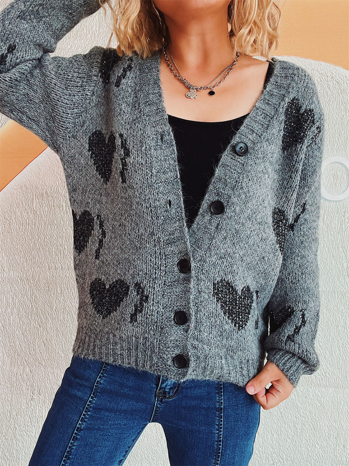 Cárdigan de manga larga con botones en forma de corazón