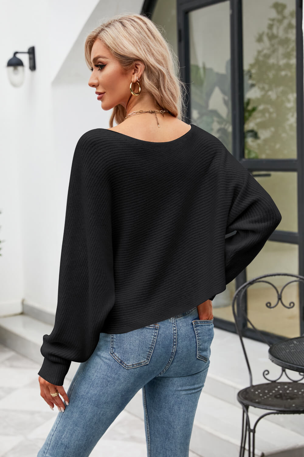 Suéter con manga dolman y canalé horizontal con cuello barco