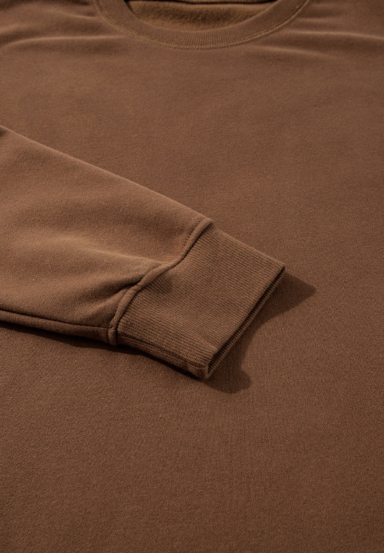 Conjunto de pantalón y top de manga larga con cuello redondo y abertura lateral