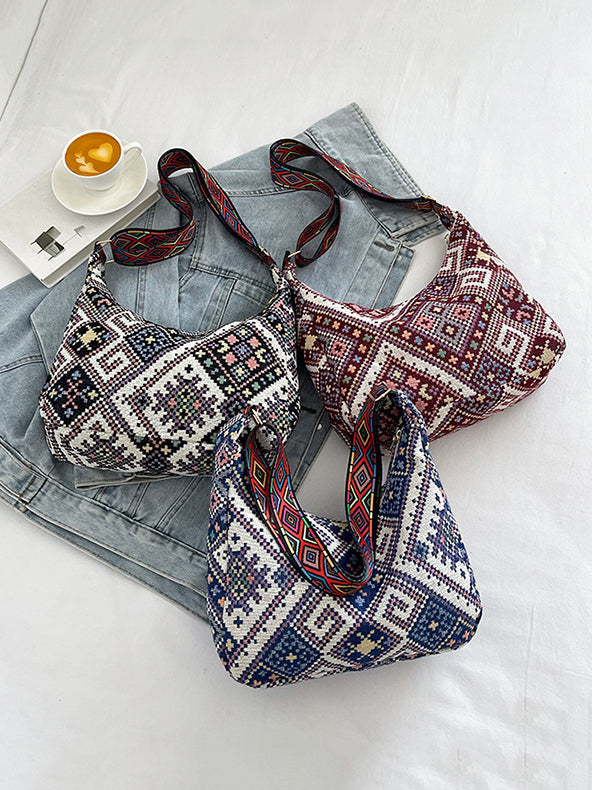 Bolso bandolera con correa ajustable y diseño geométrico