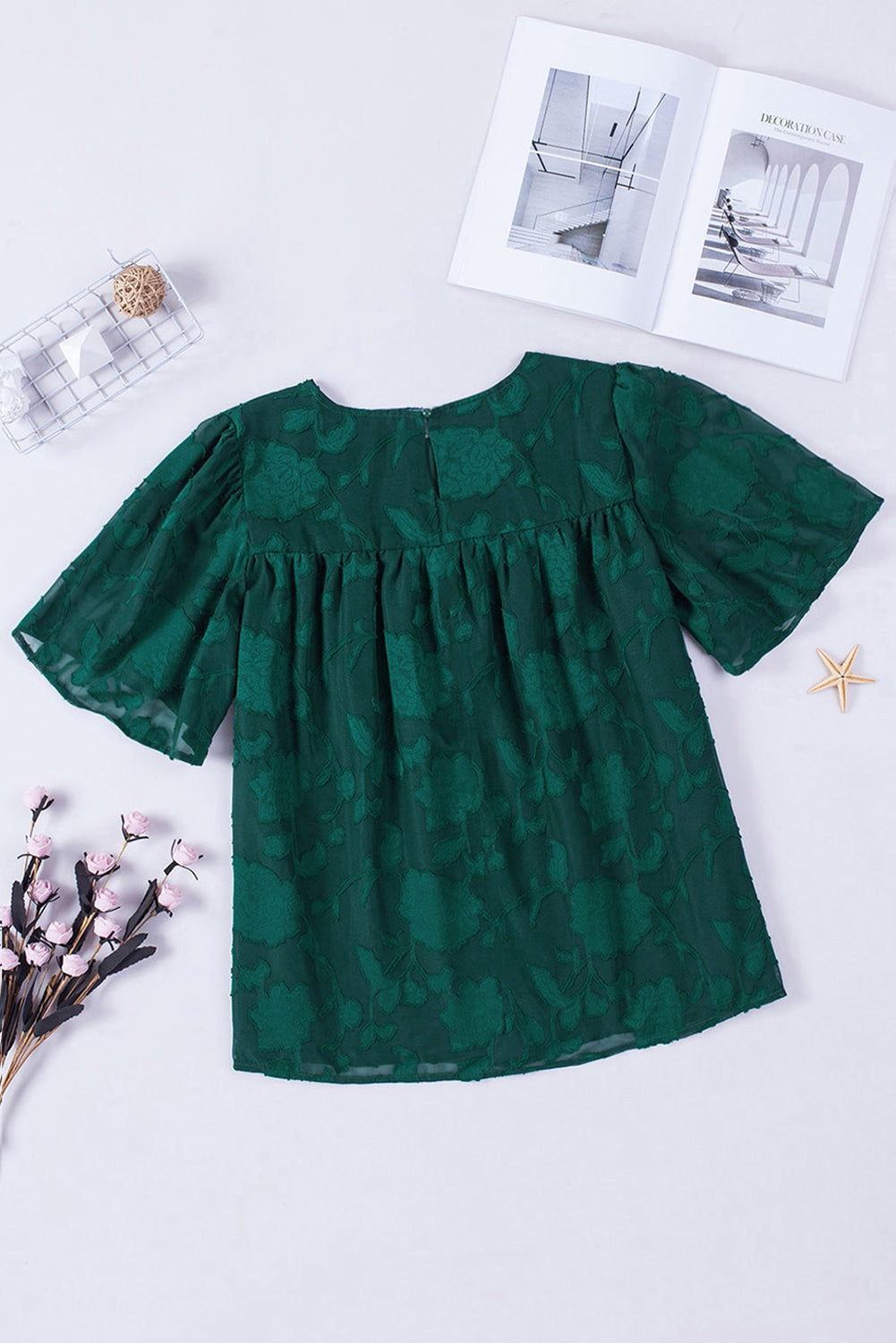 Blusa con cuello redondo y mangas abullonadas