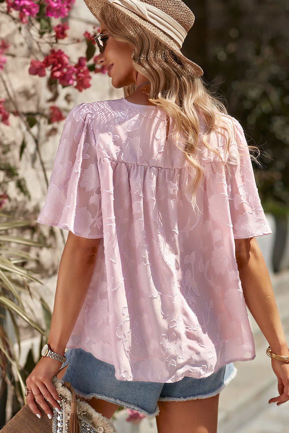 Blusa con cuello redondo y mangas abullonadas