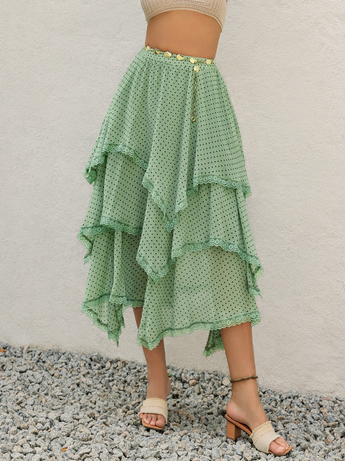 Falda estampada con capas y detalle de encaje