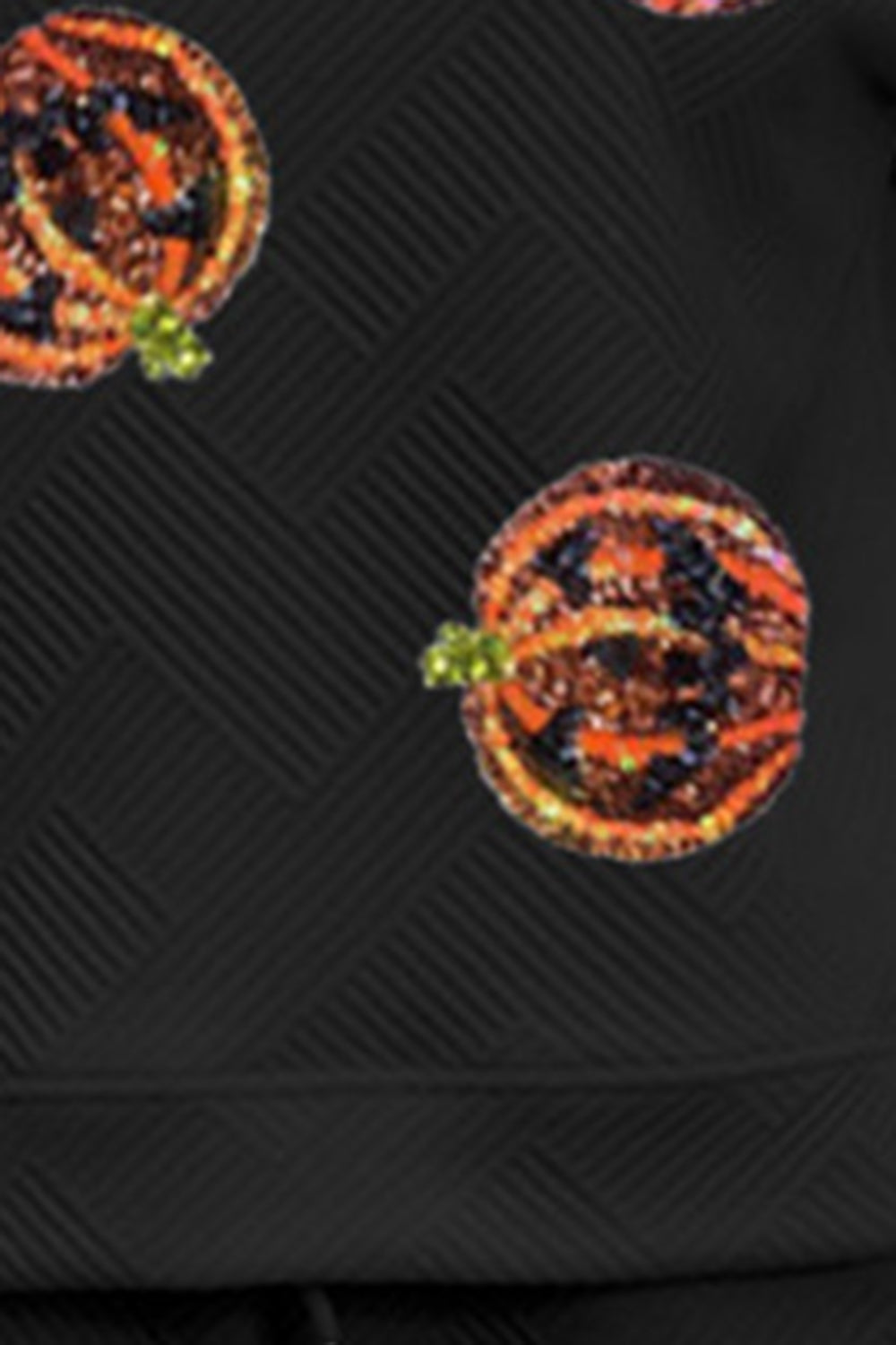 Conjunto de top y pantalón con parche de calabaza y lentejuelas