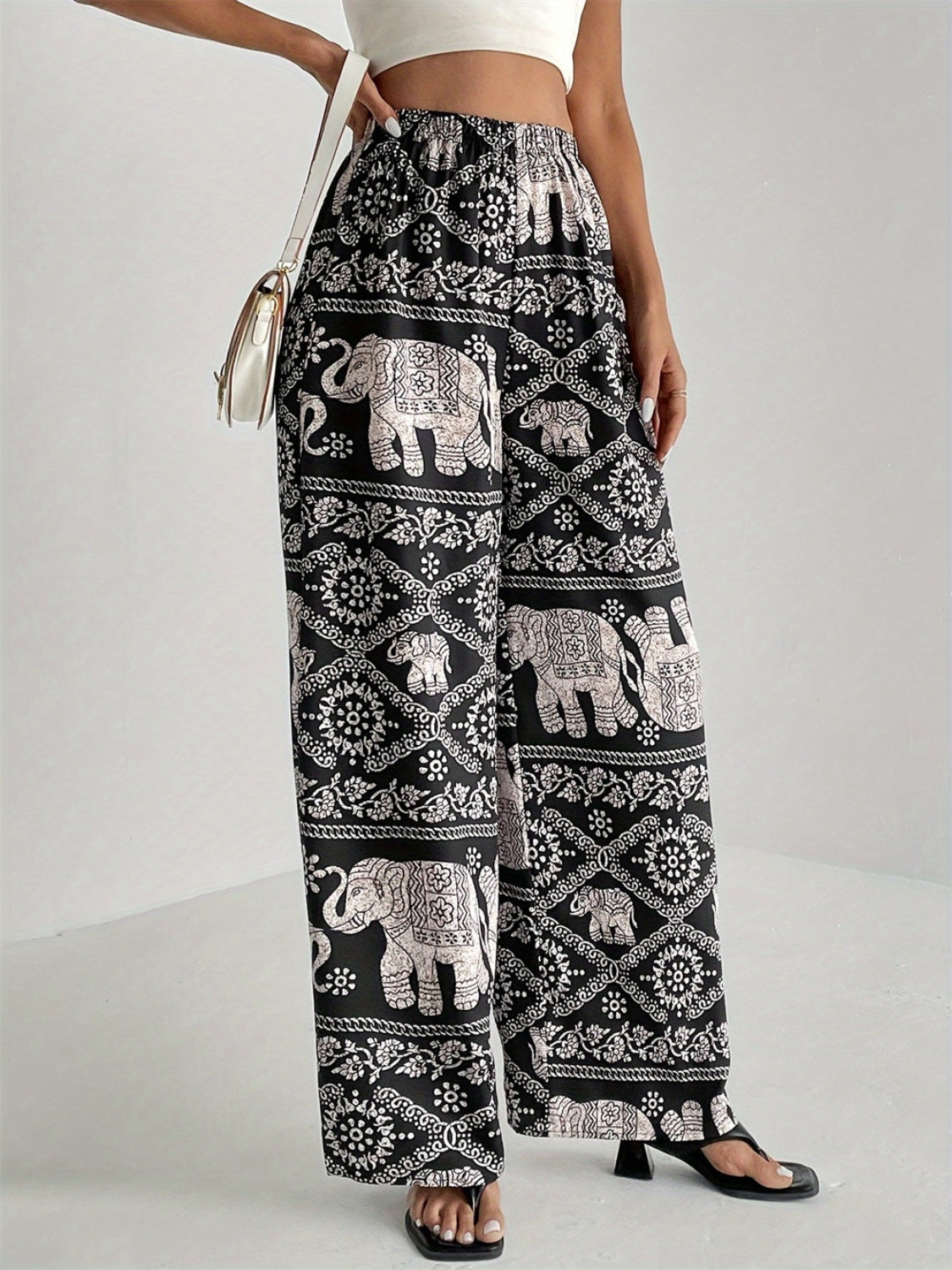 Pantalones anchos con cintura elástica y estampados