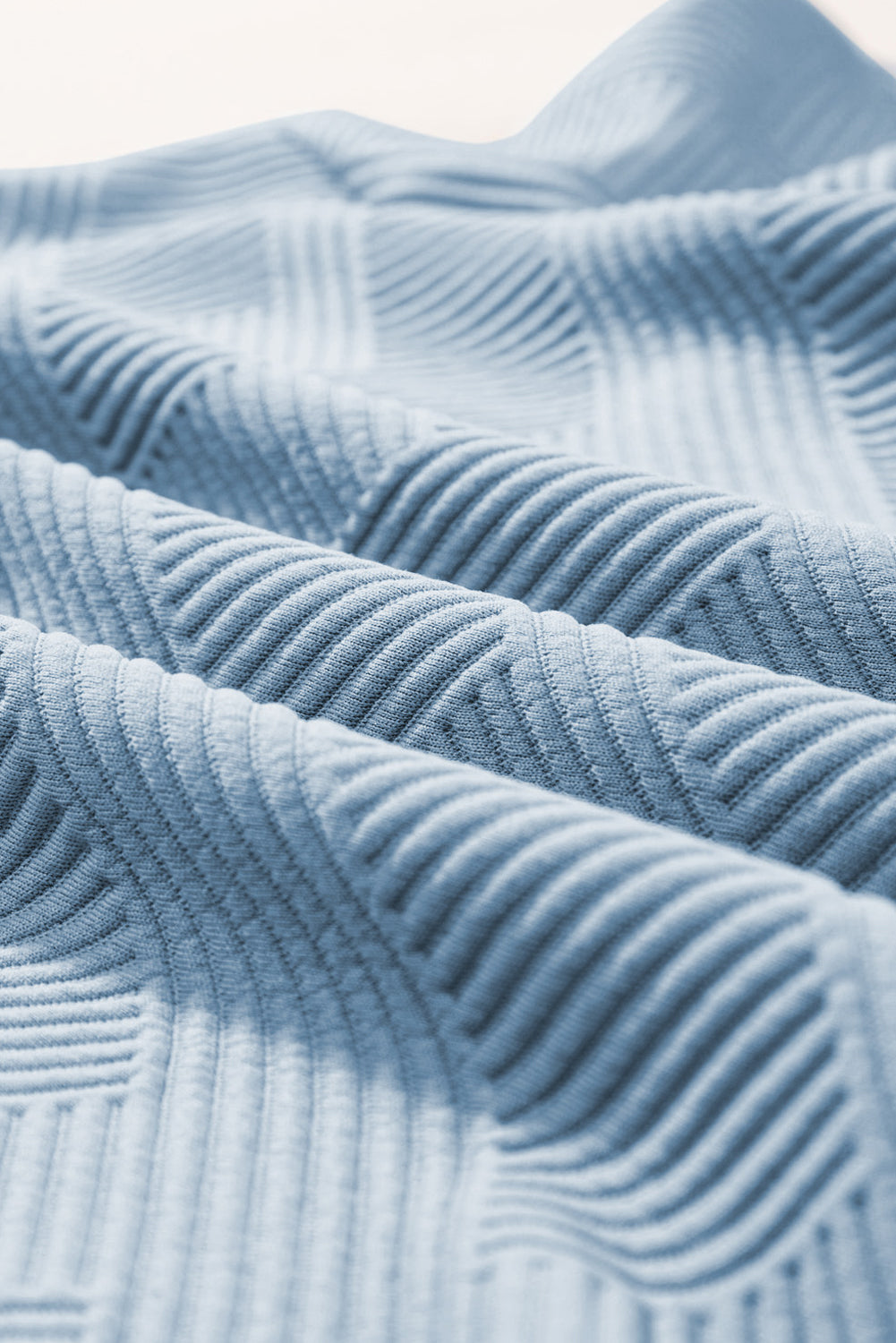 Conjunto de top con cuello texturizado y pantalones de pierna ancha