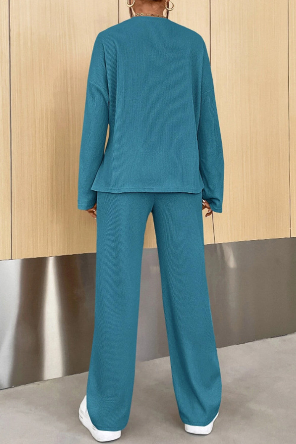 Conjunto de pantalón y top con medio botón acanalado