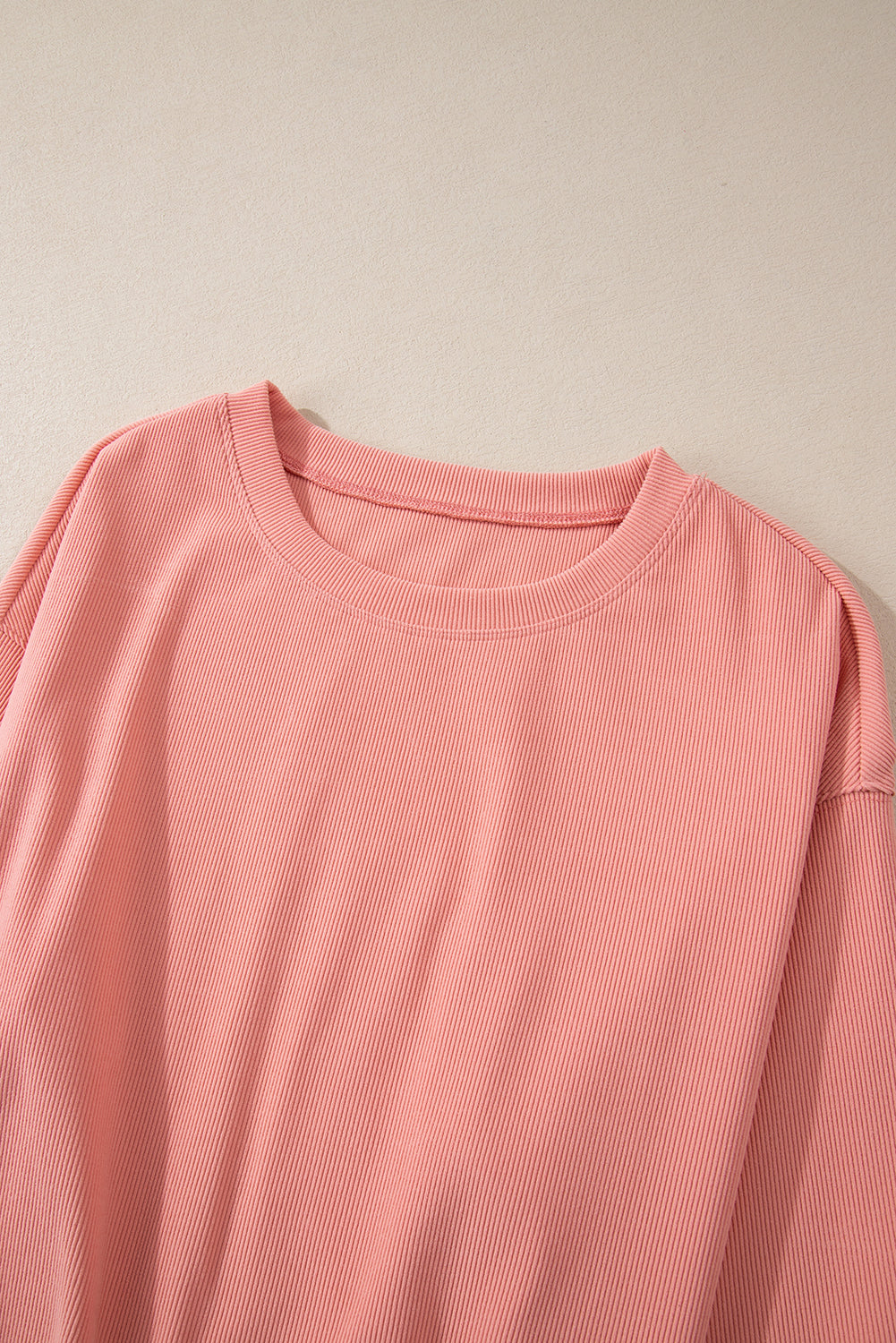 Conjunto de pantalón y top de manga larga con cuello redondo