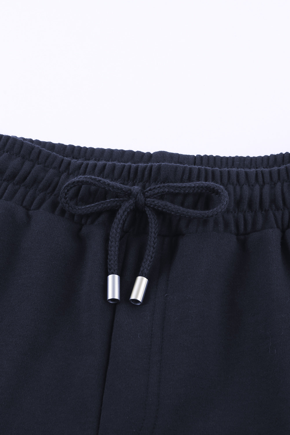 Pantalones cortos con puños y cordón en la cintura