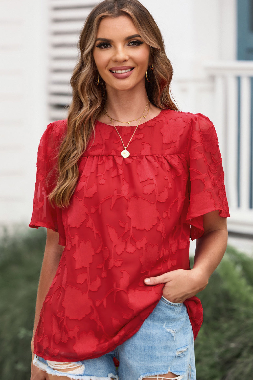Blusa con cuello redondo y mangas abullonadas