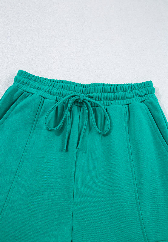 Conjunto de pantalón con cordón y camiseta de manga larga con cuello redondo de talla grande