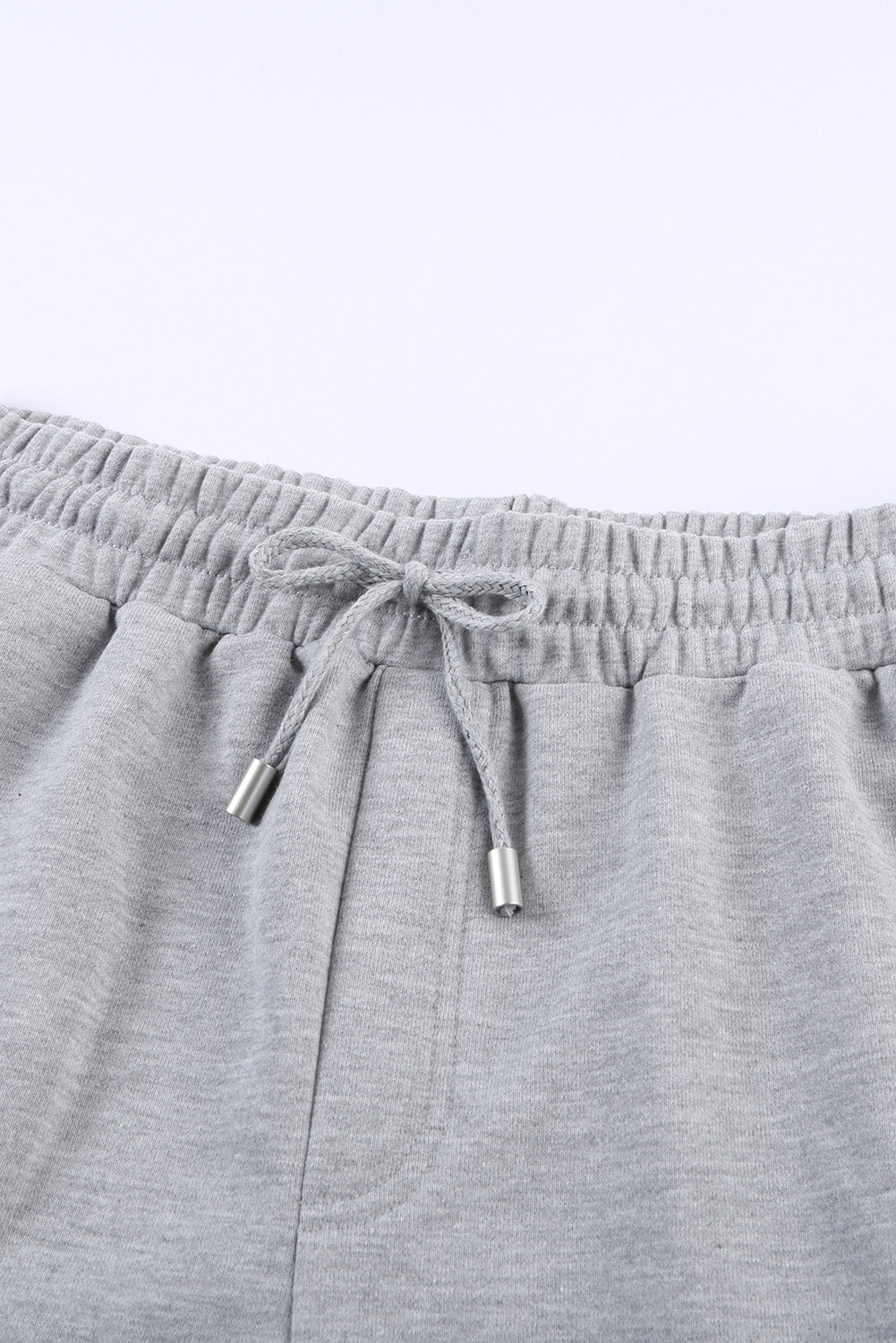 Pantalones cortos con puños y cordón en la cintura